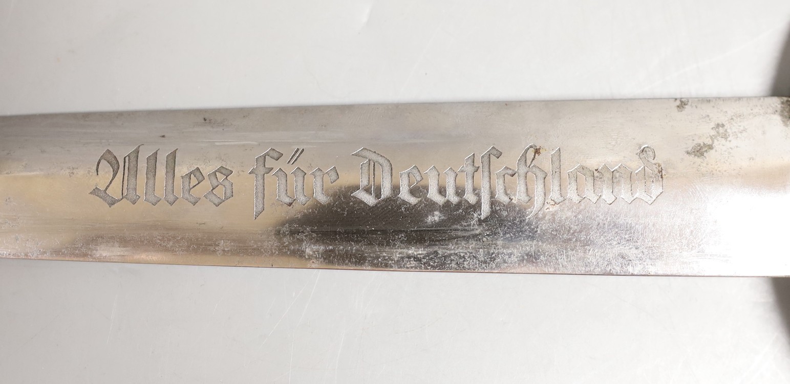 A German Third Reich SA dagger, Solingen blade, 37 cms long.